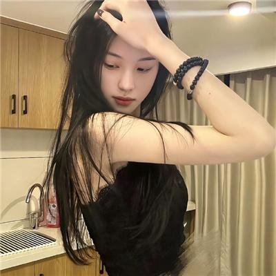 照片的她